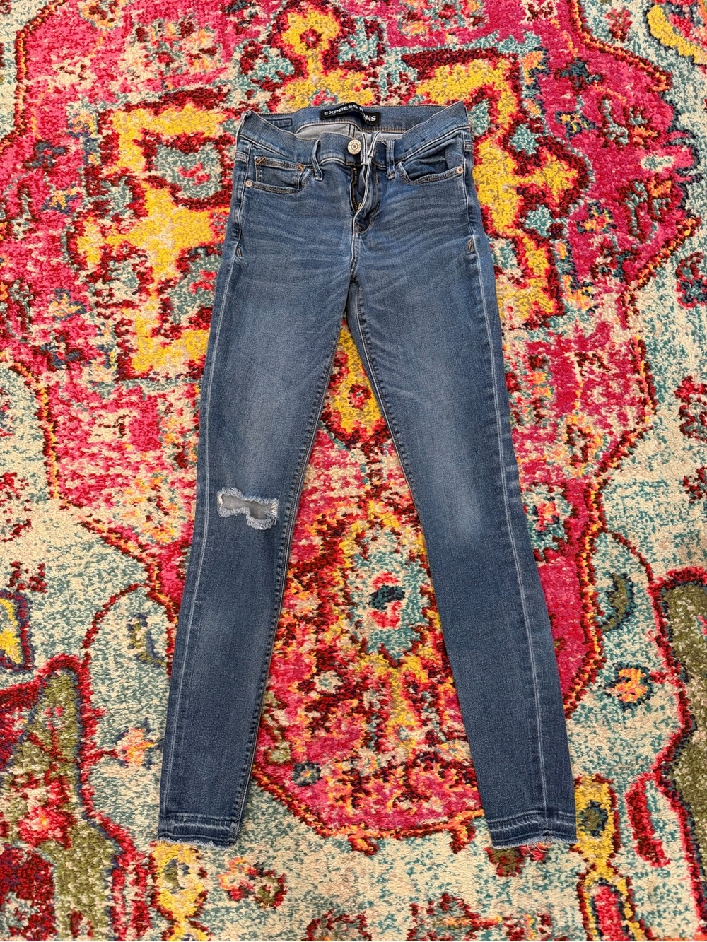 Express Blue Skinny Jeans with Distressed Knee